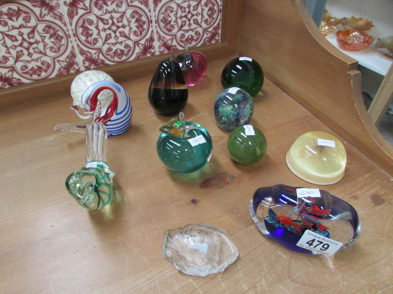 A quantity of paperweights