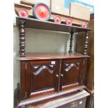 A mahogany TV stand/cabinet