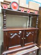 A mahogany TV stand/cabinet