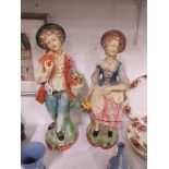 A pair of continental porcelain figures