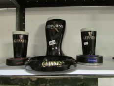 A Guinness clock and 3 other Guinness it