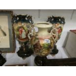 A pair of Victorian vases and one other,