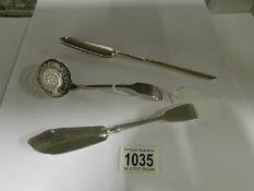 A silver sifter spoon, a Georgian silver