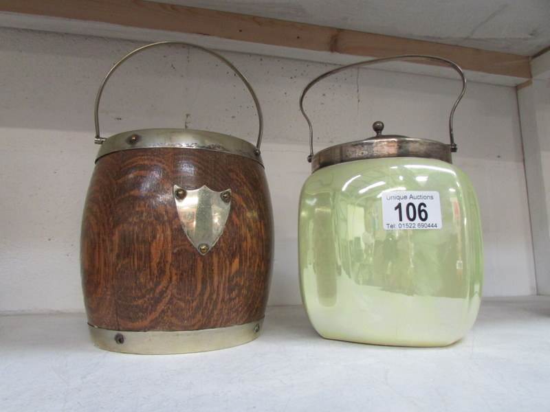 An oak biscuit barrel and a ceramic bisc