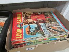 A box of Look and Learn comics