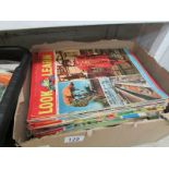 A box of Look and Learn comics