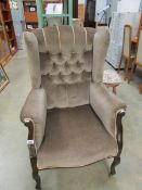 A wing armchair