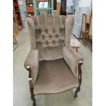 A wing armchair