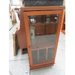 A teak record cabinet by Morris of Glasg