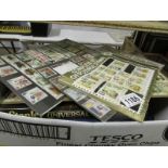 A large collection of stamps, loose and