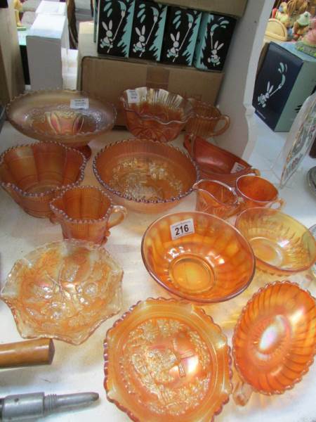 14 pieces of orange carnival glass