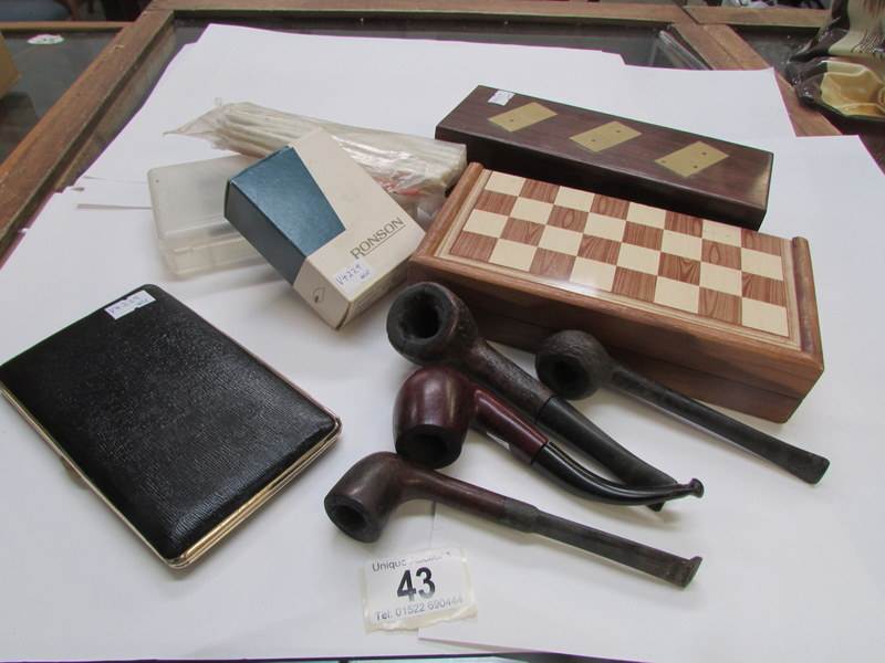 A cased set of dominoes, chess, darts, p