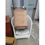 A linen bin and a stool