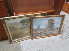 A pair of gilt framed farming prints