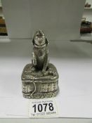 A silver 'filled' dog figurine signed F