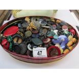 A tin of old buttons