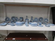 A shelf of Wedgwood blue jasper ware