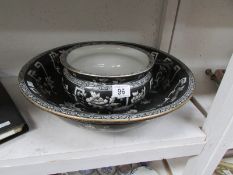 A large wash bowl and matching chamber p