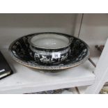 A large wash bowl and matching chamber p