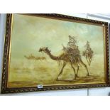 An oil on canvas of camels in the desert