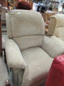 A hand operated reclining chair