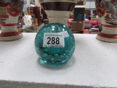 A turquoise blue glass dump/inkwell