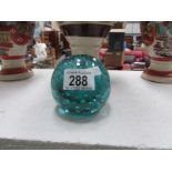 A turquoise blue glass dump/inkwell