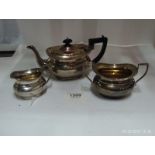 A 3 piece silver tea service, approx. 66