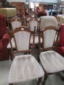 A set of 6 upholstered dining chairs