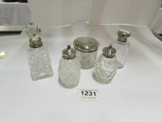 5 silver topped pots including salt and