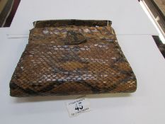 A crocodile skin handbag, a/f