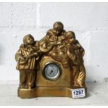 An Art Deco plaster figure thermometer