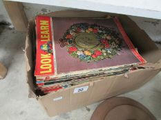 A box of Look and Learn comics
