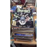 A large collection of graphic novels and