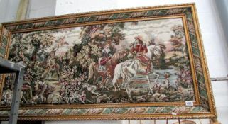 A framed tapestry