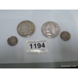 4 American coins including silver dollar