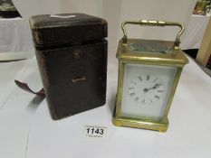 A cased Victorian  brass carriage clock