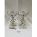 A pair of porcelain Cherub posy bowls