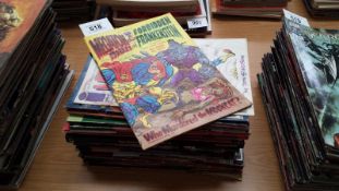 A large collection of comics and graphic