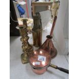 A pair of brass candlesticks, copper fun