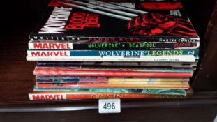 A collection of Wolverine comics and gra