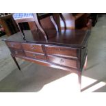 A Stag mahogany 6 drawer dressing table