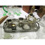 A silver plate tea set on tray