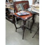 A mahogany occasional table