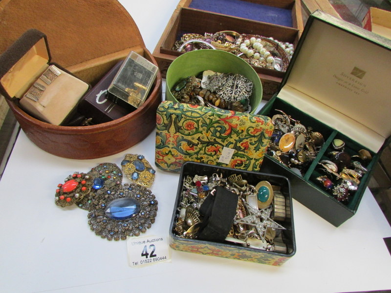 A mixed lot of costume jewellery, cuff l