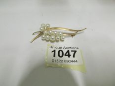A circa 1970's 14ct gold pearl set ring