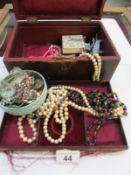 A jewellery box and costume jewellery