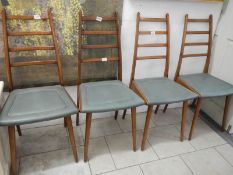 A set of 4 Beautility chairs