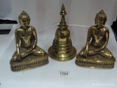 2 brass Buddha's and one other item