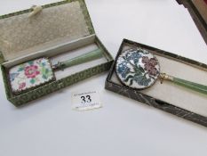 2 boxed Oriental hand mirrors